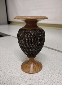 Turned vase with embellishments